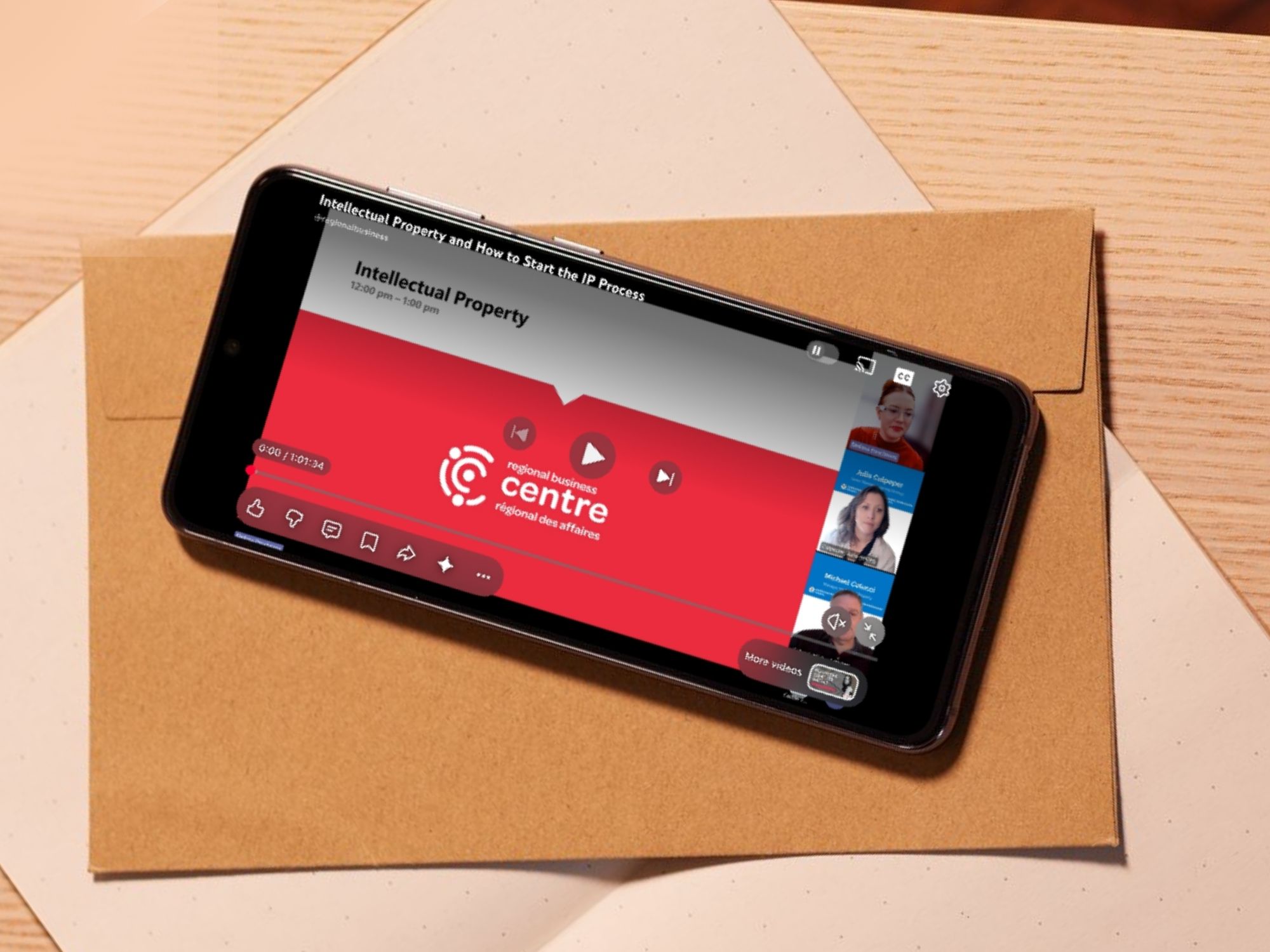 mobile phone with webinar on screen